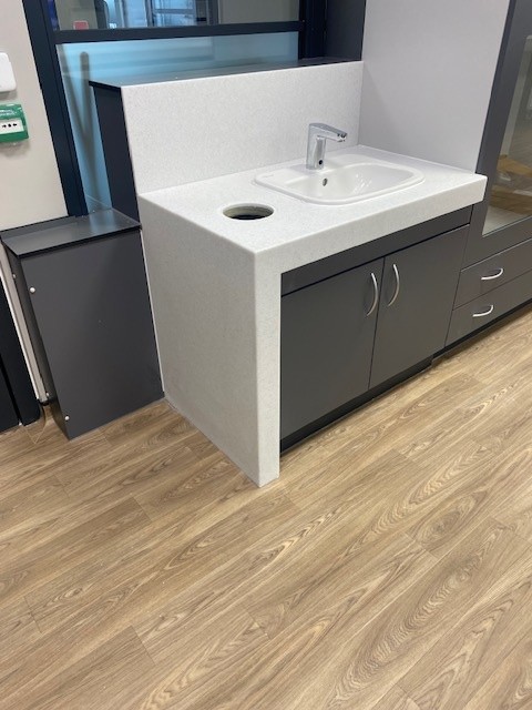 Seamless solid surface bathroom worktop installation in Leicester - project photo 10
