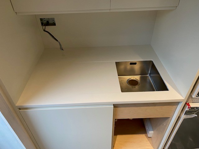 Seamless solid surface bathroom worktop installation in Leicester - project photo 14