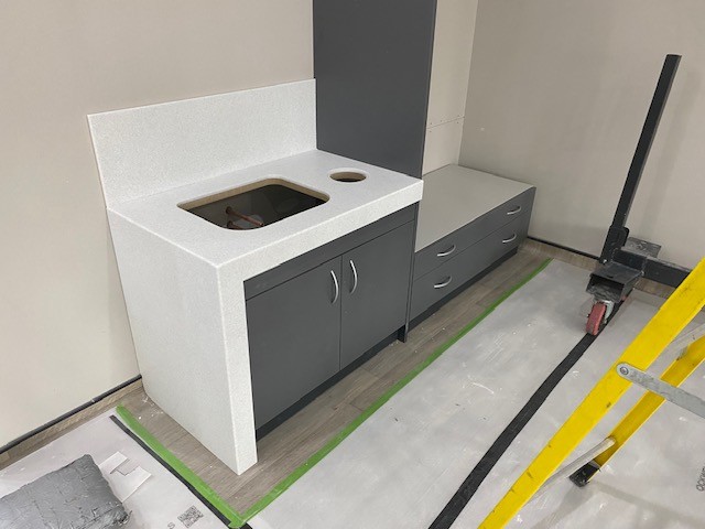 Seamless solid surface bathroom worktop installation in Leicester - project photo 30