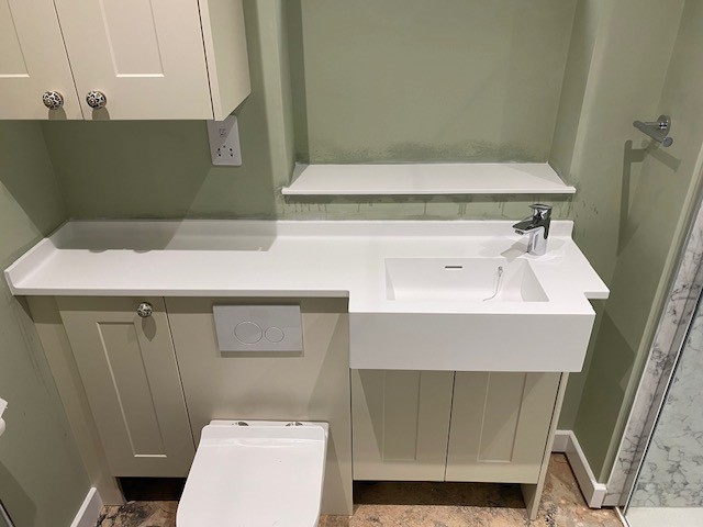 Seamless solid surface bathroom worktop installation in Leicester - project photo 38