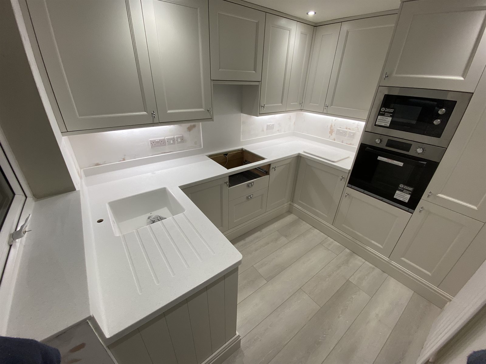Seamless solid surface bathroom worktop installation in Leicester - project photo 46